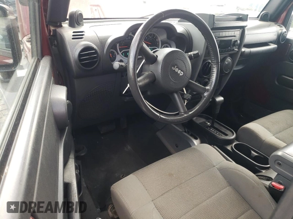 2007 Jeep Wrangler Sahara с VIN 1J4FA54137L205242, выставлен на аукционе Copart как лот 65080025 с пробегом 128 682 миль миль и Списание • Salvage title. История ставок и продаж доступна на DreamBid. Изображение 8.