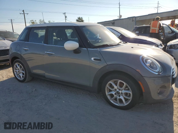 2021 MINI Hardtop 4 Door Oxford Edition with VIN WMWXU7C03M2N94906, listed as a Copart auction lot 75537424 with Not provided miles and Non repairable. Bid and sale history available at DreamBid. Image 4.