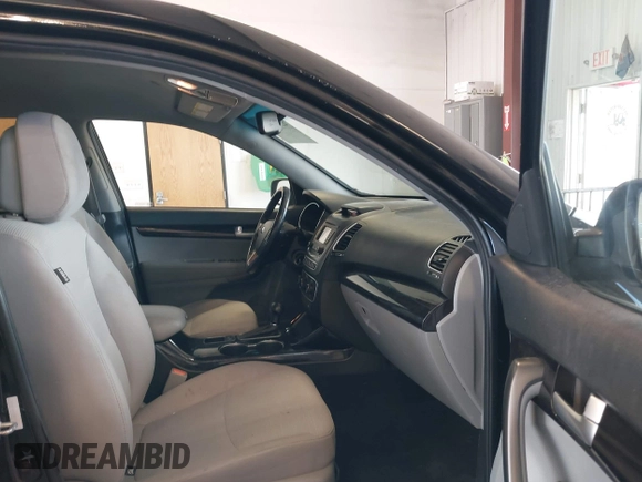 2014 Kia Sorento LX with VIN 5XYKTCA64EG541574, listed as a IAAI auction lot 42067910 with 144,234 mi miles and . Bid and sale history available at carsss.com. Image 5.