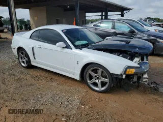 2003 Ford Mustang SVT Cobra with VIN 1FAFP48Y33F397086, listed as a Copart auction lot 73212754 with 150,184 mi miles and Salvage Title. Bid and sale history available at carsss.com. Image 4.