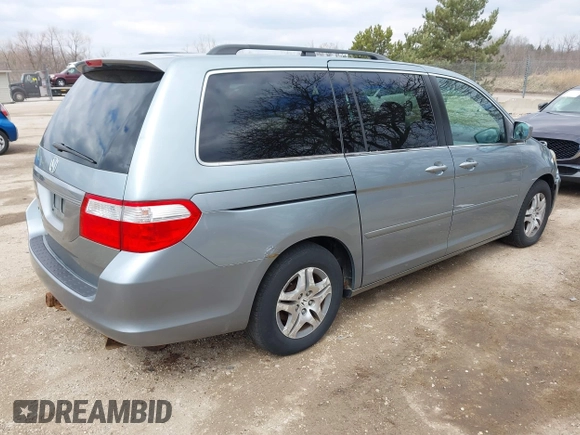 2007 Honda Odyssey EX-L with VIN 5FNRL38717B018097, listed as a IAAI auction lot 42028592 with 141,004 mi miles and . Bid and sale history available at DreamBid. Image 4.