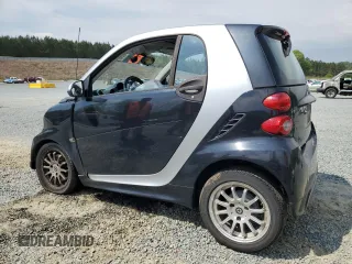 2013 Smart fortwo Pure with VIN WMEEJ3BA9DK670264, listed as a Copart auction lot 52817215 with 51,434 mi miles and Salvage Title. Bid and sale history available at DreamBid. Image 2.