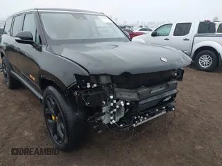 2024 Rivian R1S Adventure with VIN 7PDSGABA1RN035557, listed as a IAAI auction lot 41170478 with 5,210 mi miles. Bid and sale history available at carsss.com. Image 6.
