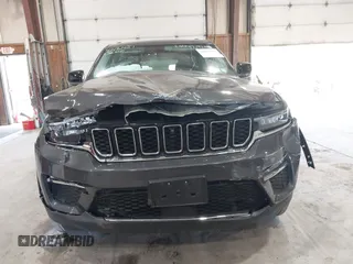 2022 Jeep Grand Cherokee with VIN 1C4RJYB65N8758560, listed as a IAAI auction lot 42182021 with 28,096 mi miles and . Bid and sale history available at DreamBid. Image 6.