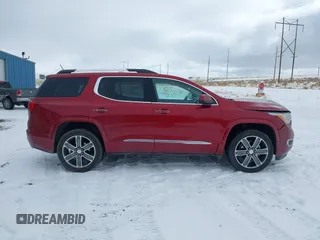 2019 GMC Acadia Denali with VIN 1GKKNXLS2KZ149738, listed as a IAAI auction lot 41213851 with 73,847 mi miles and . Bid and sale history available at carsss.com. Image 14.