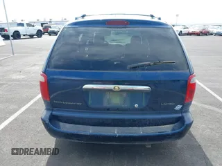 2001 Chrysler Town & Country Limited with VIN 2C8GP64L81R128221, listed as a IAAI auction lot 41630779 with 275,215 mi miles. Bid and sale history available at carsss.com. Image 14.