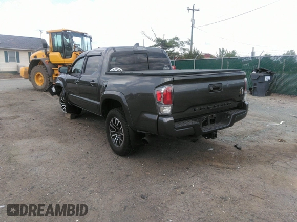 2021 Toyota Tacoma SR z VIN 3TYCZ5AN7MT017377, wystawiony jako IAAI lot #42285326 z przebiegiem 91 657 mil mil oraz . Historia ofert i sprzedaży dostępna na DreamBid. Obrazek 3.