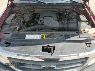 2001 Ford F-150 XLT with VIN 1FTRW076X1KC42302, listed as a Copart auction lot 59868295 with 234,772 mi miles and Salvage title. Bid and sale history available at DreamBid. Image 11.