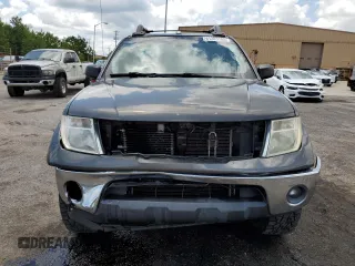 2008 Nissan Frontier SE with VIN 1N6AD07UX8C406795, listed as a Copart auction lot 61303185 with 145,742 mi miles and Salvage title. Bid and sale history available at DreamBid. Image 5.