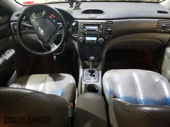 2007 Kia Optima EX with VIN KNAGE124675137864, listed as a Copart auction lot 87433434 with 141,682 mi miles and Salvage Title. Bid and sale history available at carsss.com. Image 8.