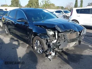 2019 Kia Optima LX with VIN 5XXGT4L32KG324877, listed as a IAAI auction lot 41713482 with 160,178 mi miles. Bid and sale history available at carsss.com. Image 1.