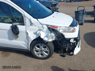 2014 Ford Transit Connect Wagon XLT with VIN NM0GE9F74E1133531, listed as a IAAI auction lot 41744477 with 73,653 mi miles. Bid and sale history available at carsss.com. Image 6.