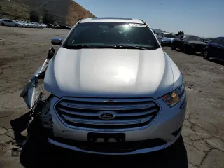 2015 Ford Taurus Limited с VIN 1FAHP2F84FG106058, выставлен на аукционе Copart как лот 57621355 с пробегом 130 582 миль миль и Списание • Salvage title. История ставок и продаж доступна на DreamBid. Изображение 5.