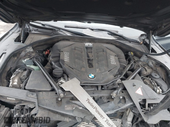 2015 BMW 7 Series 750i xDrive with VIN WBAYB6C59FD965820, listed as a IAAI auction lot 41558215 with 142,617 mi miles. Bid and sale history available at carsss.com. Image 10.
