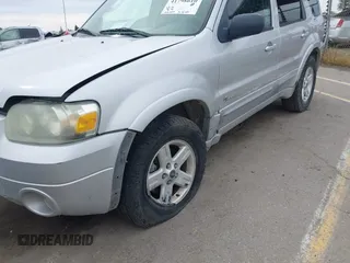 2005 Ford Escape Hybrid with VIN 1FMCU95H05KC95225, listed as a IAAI auction lot 41798610 with 216,659 mi miles and . Bid and sale history available at DreamBid. Image 6.