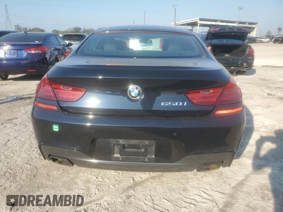 2015 BMW 6 Series 650i xDrive with VIN WBA6B4C55FD761530, listed as a Copart auction lot 75430464 with 18,729 mi miles and Salvage Title. Bid and sale history available at DreamBid. Image 6.