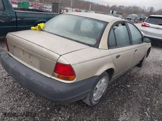 1999 Saturn SL with VIN 1G8ZH5282XZ273375, listed as a IAAI auction lot 41787290 with 230,397 mi miles. Bid and sale history available at carsss.com. Image 4.