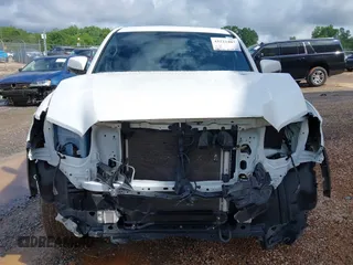 2023 Toyota Tacoma SR with VIN 3TMCZ5AN7PM639378, listed as a IAAI auction lot 42222407 with 38,172 mi miles and . Bid and sale history available at DreamBid. Image 12.
