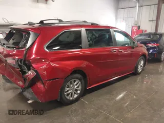 2022 Toyota Sienna XLE with VIN 5TDJRKEC2NS123067, listed as a IAAI auction lot 39982057 with 70,236 mi miles and . Bid and sale history available at DreamBid. Image 4.