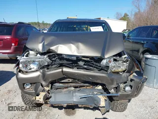 2014 Toyota Tacoma with VIN 5TFLU4EN4EX107161, listed as a IAAI auction lot 41411872 with 134,273 mi miles. Bid and sale history available at carsss.com. Image 12.
