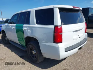2015 Chevrolet Tahoe Commercial z VIN 1GNLC2EC8FR255526, wystawiony jako IAAI lot #42538320 z przebiegiem 165 502 mil mil oraz . Historia ofert i sprzedaży dostępna na DreamBid. Obrazek 6.
