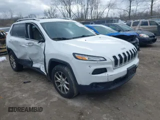 2016 Jeep Cherokee Latitude with VIN 1C4PJMCB0GW236445, listed as a IAAI auction lot 41940114 with 159,168 mi miles and . Bid and sale history available at DreamBid. Image 1.