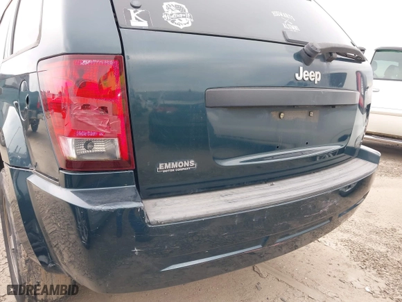 2005 Jeep Grand Cherokee Laredo with VIN 1J4GS48K45C677011, listed as a IAAI auction lot 41121018 with 210,814 mi miles. Bid and sale history available at carsss.com. Image 17.