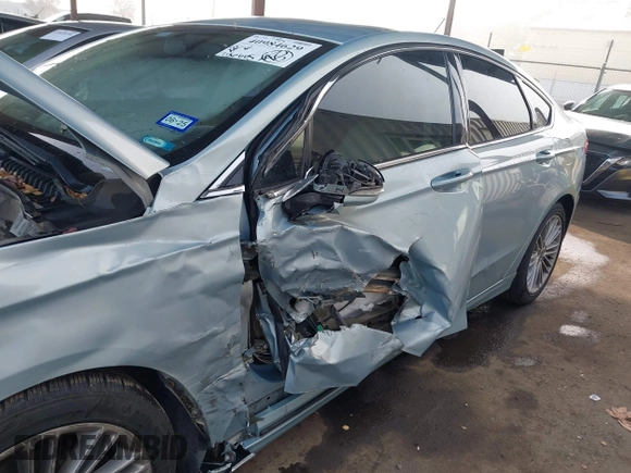 2014 Ford Fusion SE Hybrid with VIN 3FA6P0LU8ER283409, listed as a IAAI auction lot 40984629 with 206,605 mi miles. Bid and sale history available at carsss.com. Image 6.