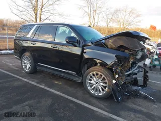 2022 Cadillac Escalade 4WD Premium Luxury with VIN 1GYS4BKL4NR147208, listed as a IAAI auction lot 41339910 with 35,436 mi miles. Bid and sale history available at carsss.com. Image 1.