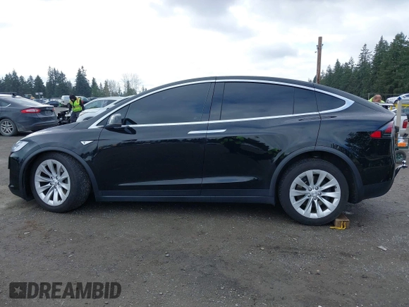 2016 Tesla Model X 70D with VIN 5YJXCBE20GF013046, listed as a IAAI auction lot 41944005 with 94,509 mi miles. Bid and sale history available at carsss.com. Image 14.