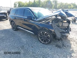 2021 Lincoln Aviator Reserve z VIN 5LM5J7WC6MGL08244, wystawiony jako IAAI lot #42024429 z przebiegiem 57 199 mil mil oraz . Historia ofert i sprzedaży dostępna na DreamBid. Obrazek 1.