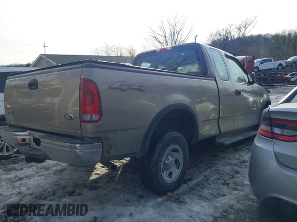 2003 Ford F-150 XL with VIN 2FTRX18W73CB07559, listed as a IAAI auction lot 41452402 with 152,509 mi miles. Bid and sale history available at carsss.com. Image 4.