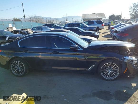 2019 BMW 5 Series 530e with VIN WBAJA9C57KB399541, listed as a IAAI auction lot 41656775 with 96,523 mi miles and . Bid and sale history available at DreamBid. Image 13.