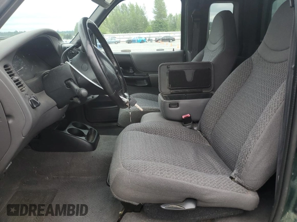 1999 Ford Ranger XL with VIN 1FTYR14VXXTA97866, listed as a Copart auction lot 62703525 with 97,611 mi miles and Clean title. Bid and sale history available at DreamBid. Image 7.