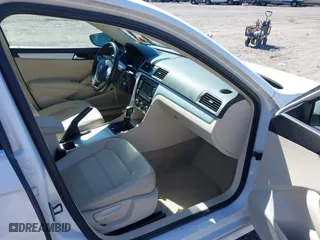 2012 Volkswagen Passat SE with VIN 1VWBP7A38CC030837, listed as a IAAI auction lot 41864669 with 169,816 mi miles. Bid and sale history available at carsss.com. Image 5.