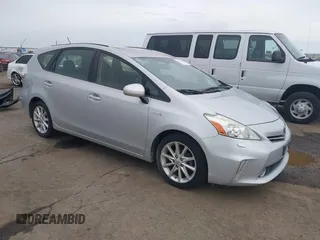 2014 Toyota Prius Two with VIN JTDZN3EU6EJ005663, listed as a IAAI auction lot 41725720 with 109,380 mi miles and . Bid and sale history available at DreamBid. Image 1.