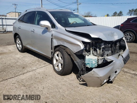 2011 Lexus RX 350 with VIN 2T2BK1BA2BC119610, listed as a Copart auction lot 54019405 with 196,083 mi miles and Salvage Title. Bid and sale history available at DreamBid. Image 4.