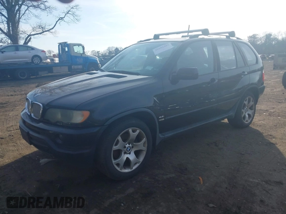 2003 BMW X5 4.4i with VIN 5UXFB33543LH43200, listed as a IAAI auction lot 41652303 with 169,250 mi miles. Bid and sale history available at carsss.com. Image 18.