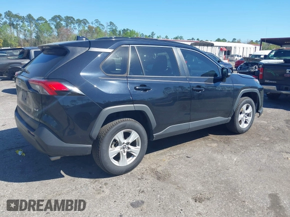 2021 Toyota RAV4 XLE with VIN 2T3W1RFV2MW107986, listed as a IAAI auction lot 41835348 with 103,450 mi miles. Bid and sale history available at carsss.com. Image 4.