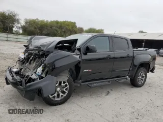 2022 GMC Canyon 4WD AT4 w/Leather with VIN 1GTG6FEN2N1294071, listed as a Copart auction lot 84652954 with 53,076 mi miles and Salvage Title. Bid and sale history available at carsss.com. Image 1.