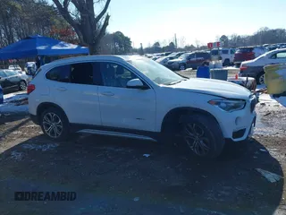 2017 BMW X1 xDrive28i with VIN WBXHT3Z36H4A52364, listed as a IAAI auction lot 41397667 with 61,960 mi miles. Bid and sale history available at carsss.com. Image 13.