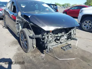 2018 Mazda 3 Touring with VIN 3MZBN1L34JM164952, listed as a IAAI auction lot 42179420 with 106,706 mi miles and . Bid and sale history available at DreamBid. Image 6.