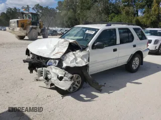 2002 Isuzu Rodeo S with VIN 4S2CK58W124322241, listed as a Copart auction lot 79009994 with 131,793 mi miles and Salvage Title. Bid and sale history available at DreamBid. Image 1.