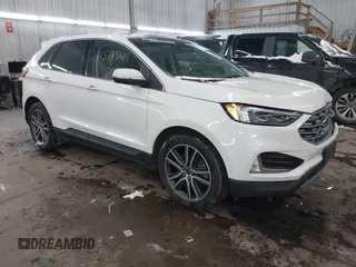 2020 Ford Edge Titanium with VIN 2FMPK4K96LBB31461, listed as a IAAI auction lot 41517961 with 140,018 mi miles. Bid and sale history available at carsss.com. Image 1.