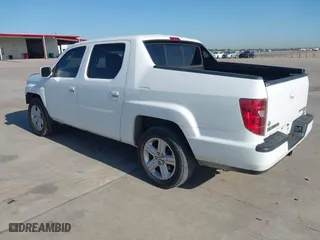 2010 Honda Ridgeline RTL with VIN 5FPYK1F54AB011339, listed as a IAAI auction lot 41983918 with 201,124 mi miles. Bid and sale history available at carsss.com. Image 3.
