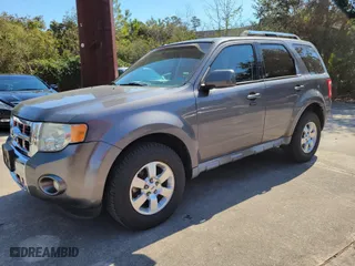 2011 Ford Escape Limited with VIN 1FMCU0E73BKA47257, listed as a IAAI auction lot 41707062 with 187,836 mi miles. Bid and sale history available at carsss.com. Image 1.
