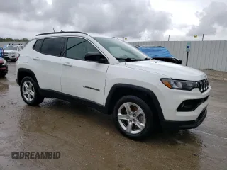 2023 Jeep Compass Latitude with VIN 3C4NJDBN9PT522979, listed as a Copart auction lot 51697115 with 60,173 mi miles and Salvage title. Bid and sale history available at DreamBid. Image 4.