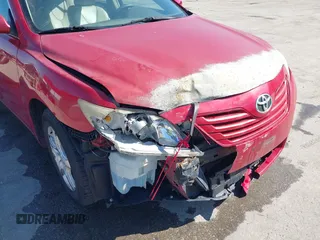 2007 Toyota Camry CE with VIN JTNBE46K073031988, listed as a IAAI auction lot 42062321 with 238,925 mi miles. Bid and sale history available at carsss.com. Image 6.