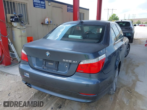 2008 BMW 5 Series 528xi with VIN WBANV13548CZ52379, listed as a IAAI auction lot 42179204 with 152,814 mi miles. Bid and sale history available at carsss.com. Image 4.