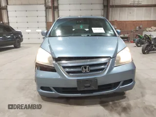 2006 Honda Odyssey EX-L with VIN 5FNRL38726B078467, listed as a IAAI auction lot 41874268 with 178,580 mi miles and . Bid and sale history available at DreamBid. Image 6.